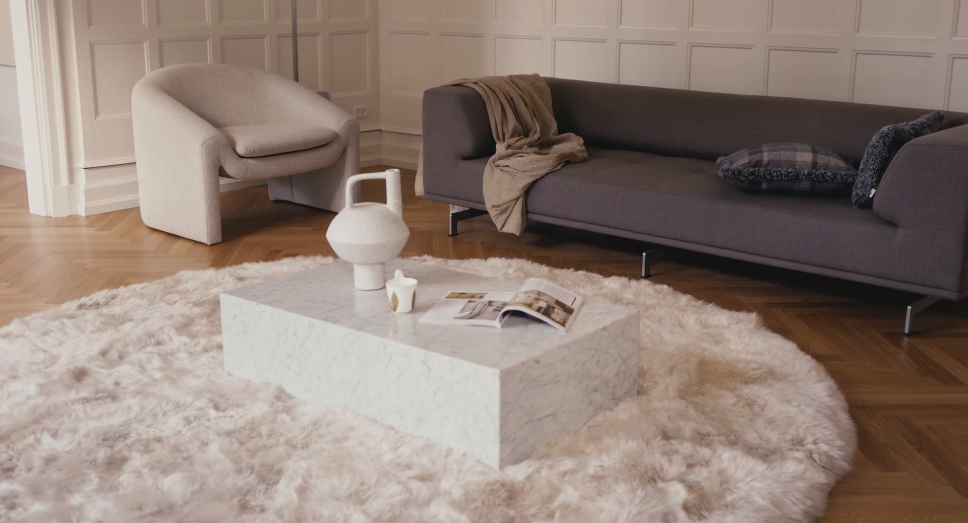 The same round long wool sheepskin rug shown in different colors