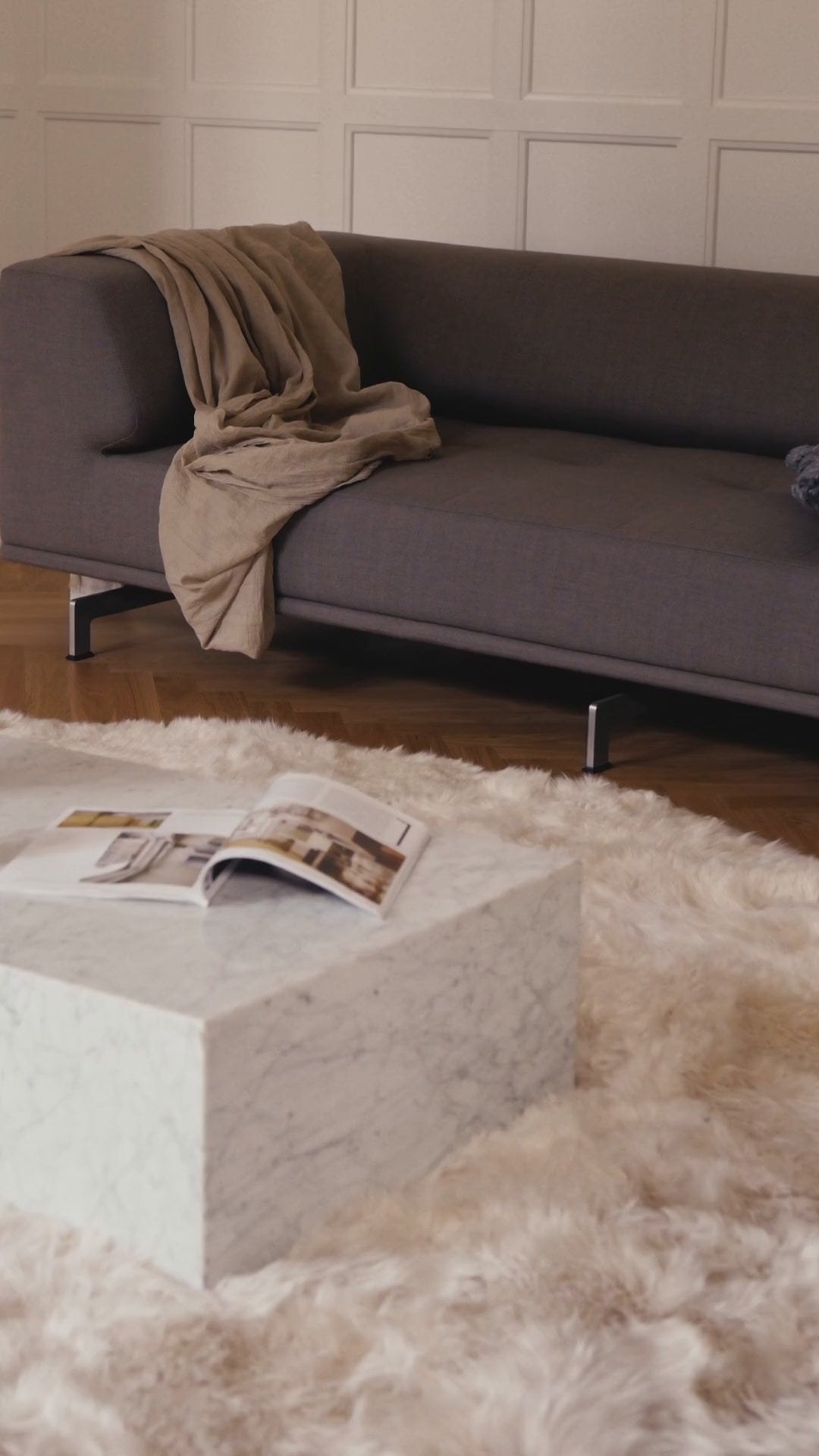 The same round long wool sheepskin rug shown in different colors