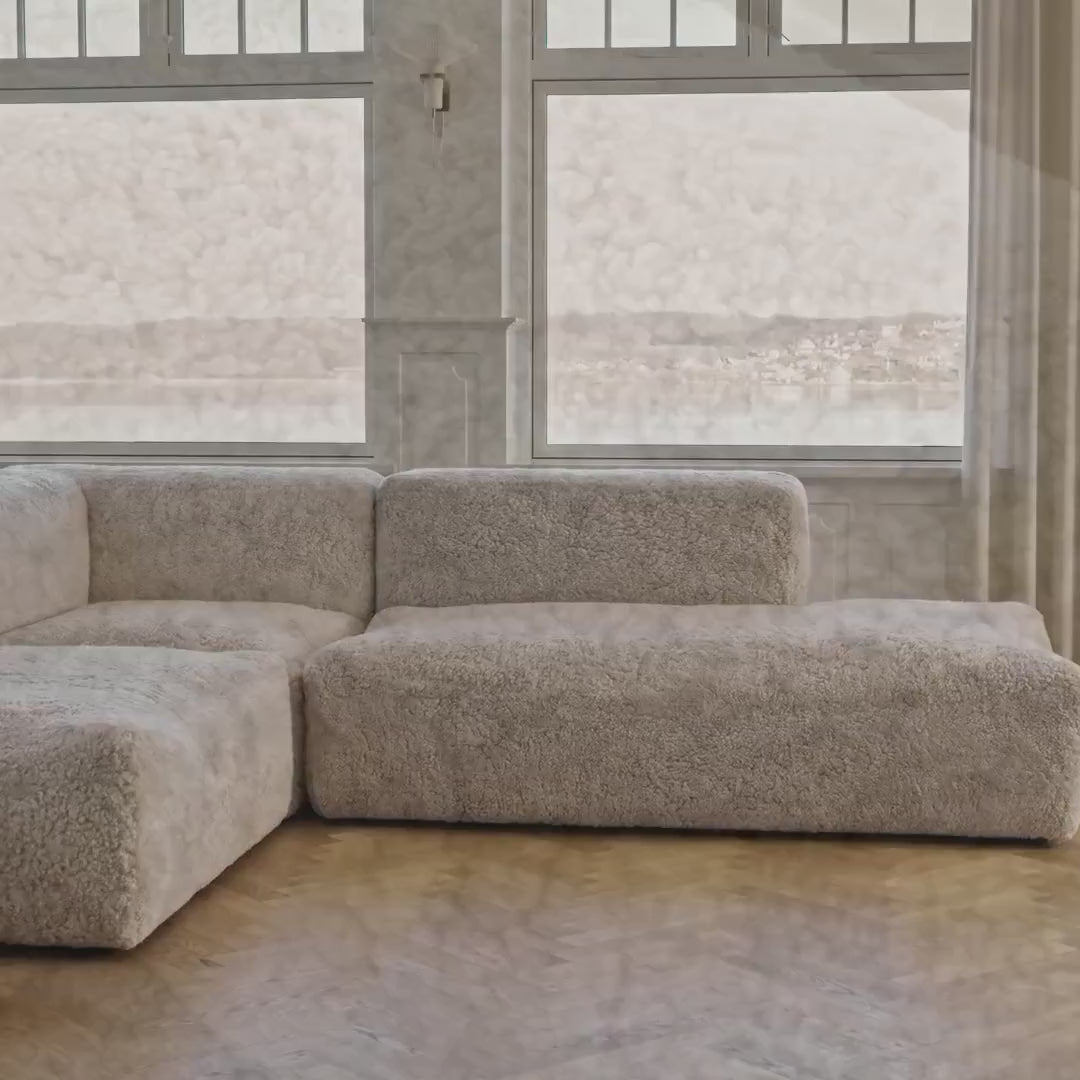 Close-up of short-wool sheepskin on a sofa