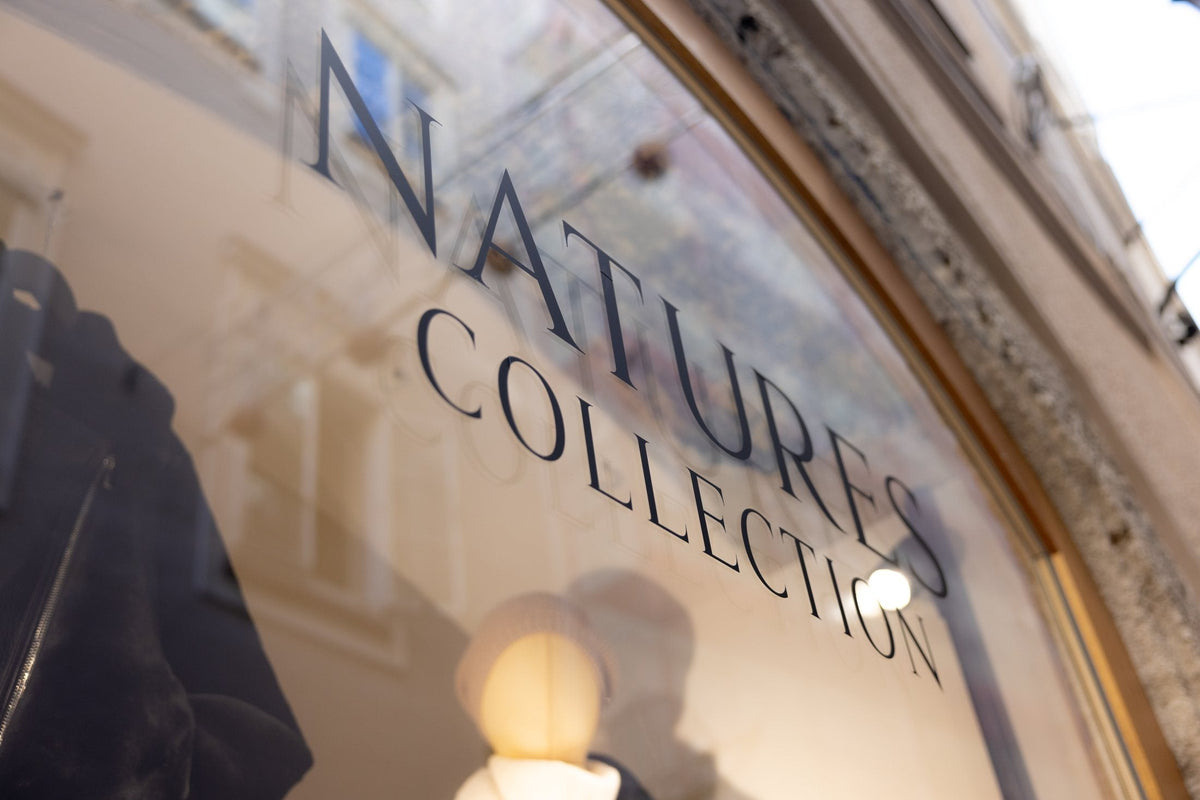 The Natures Collection logo on a shop window